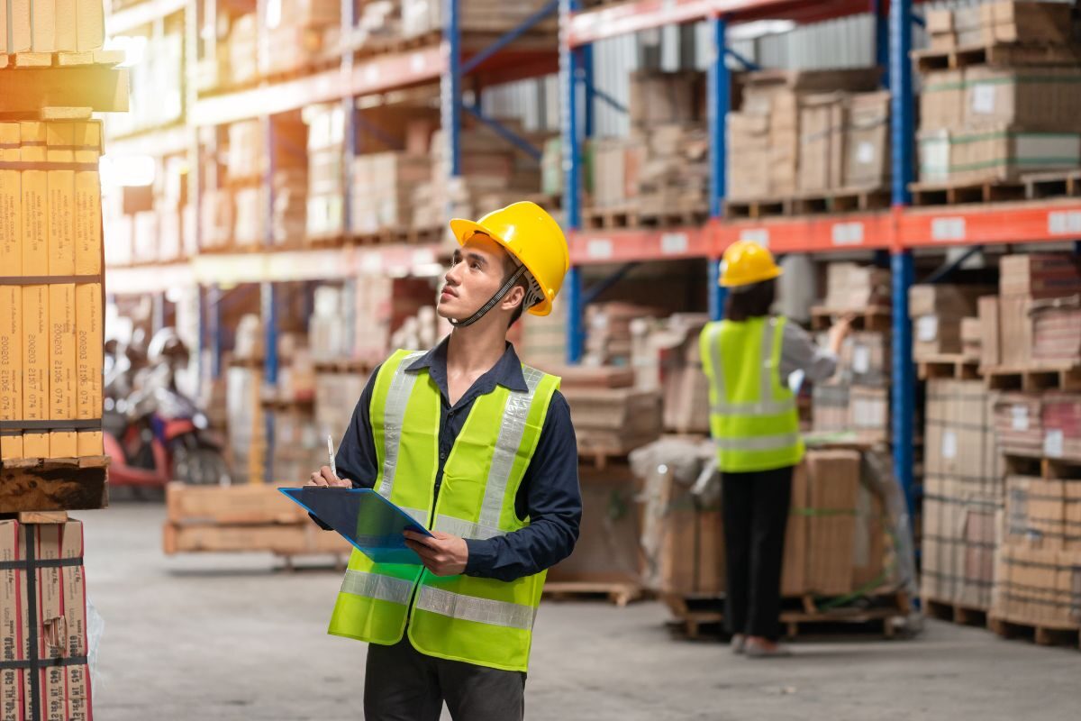 Warehouse crew sorting parcels at a fulfilment centre